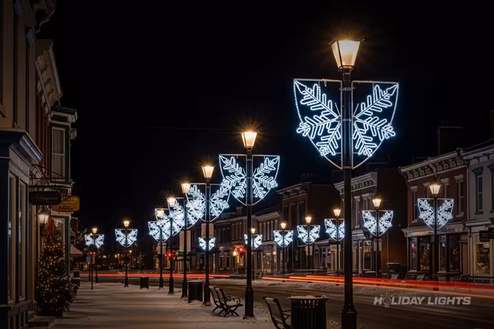 Professional municipal Christmas light installation in Le Ray, New York — Lamp Post Decorations